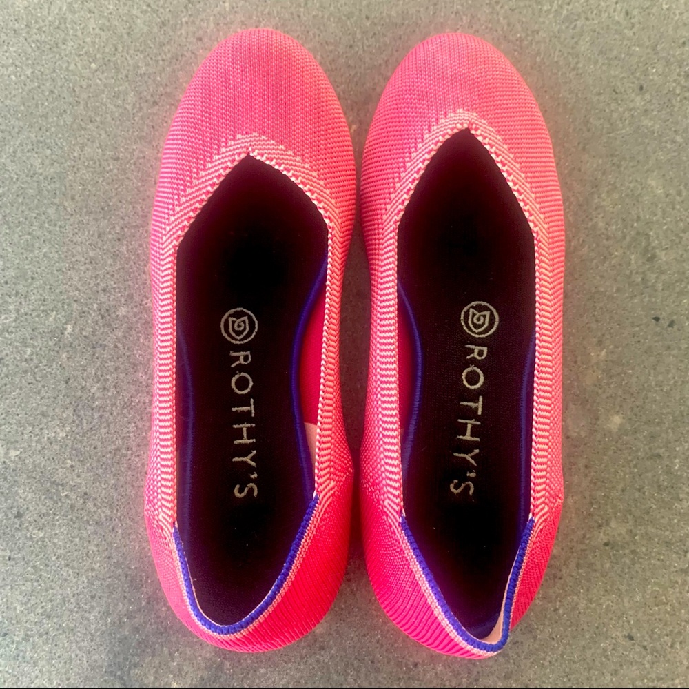 Pink round toe Rothy’s called Raspberry Birdseye flats.